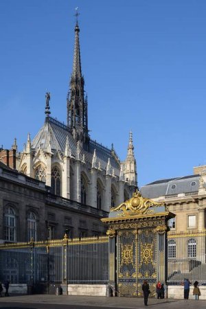 East view of Sainte-Chapelle with gate at the Cour de Mai of the Palais de Justice in Paris