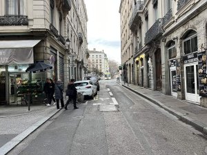 Rue Sainte-Catherine street view in Lyon with buildings and pedestrians