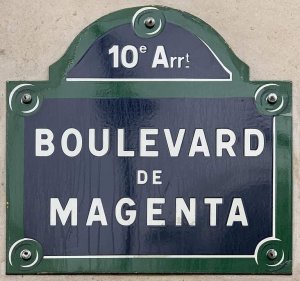 Street name plaque for Boulevard de Magenta in Paris