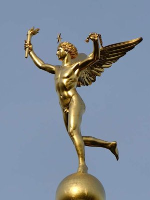 Gilded bronze statue The Genius of Liberty atop the July Column at Place de la Bastille Paris