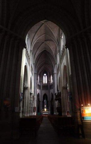 Main nave interior of Saint-Clément Church in Nantes showing architectural details and pews