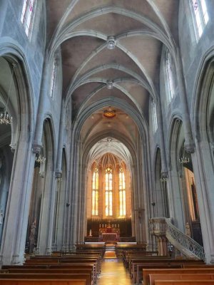 Interior of Saint-Georges Church showing architectural details and seating