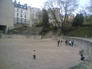 Ancient Roman arena ruins visible in Paris with stone seating and arches