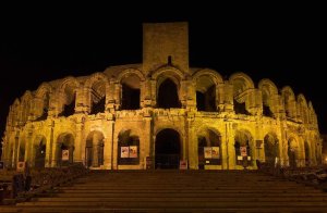 Arles Amphitheatre illuminated at night seen from the north side