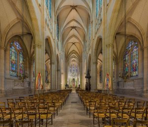 Interior view of the Basilica of Saint Clotilde showing architectural details and stained glass windows in Paris