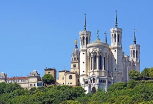 Exterior view of Basilica of Notre-Dame de Fourvière with intricate architecture and towers