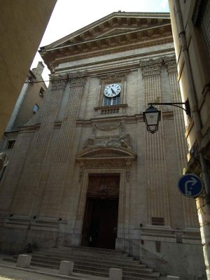 Exterior view of Église Saint-Polycarpe showing its architectural features