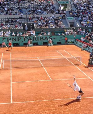 Davydenko and Nalbandian competing in a tennis match at Roland Garros