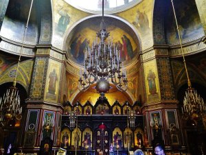 Prayer hall interior of Alexander Nevsky Cathedral with traditional Russian Orthodox design and ornate decorations