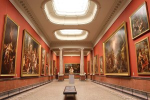 Interior view showing museum badge and permanent collection display at Musée Fabre in Montpellier