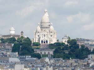 View of Montmartre hill dominated by the white Sacré Cœur Basilica