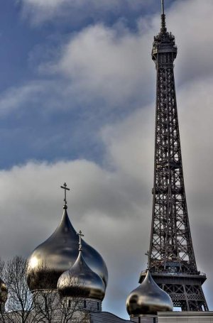Eiffel Tower and Holy Trinity Cathedral seen from Alma Bridge in Paris