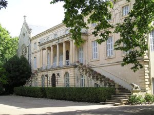 Facade of the main building and chapel of Domaine de Grammont in Montpellier