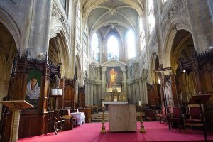 Interior view of Saint-Laurent church in Paris with architectural details