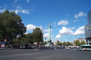 Central Place de la Bastille in Paris surrounded by buildings and street traffic
