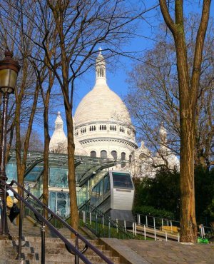 montmartre funicular railway in front of the sacré-cœur basilica paris