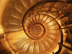 interior staircase with many steps inside the Arc de Triomphe
