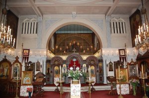 Ornate interior of St. Michael the Archangel Orthodox Church in Cannes with religious icons and decorative elements