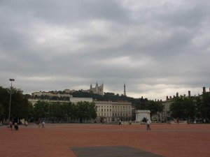 View of Place Bellecour city square with Fourvière hill in the background in Lyon France
