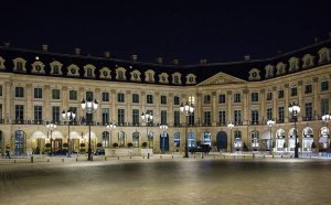illuminated Place Vendome square in Paris at night with historic buildings