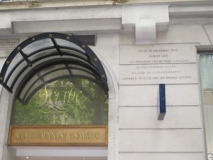 Commemorative plaque at the hotel where the first public Lumière films were shown