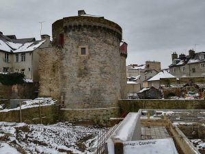 Porte Mordelaise gate in Rennes covered with snow during winter