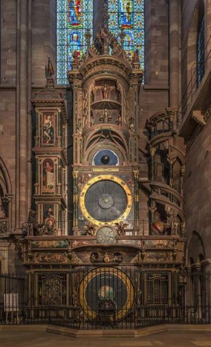 Astronomical clock inside Strasbourg Cathedral with intricate mechanical details and decorative elements