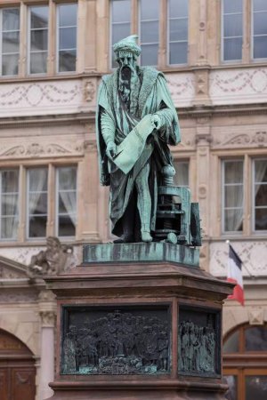 Statue of Johannes Gutenberg standing in a public square in Strasbourg