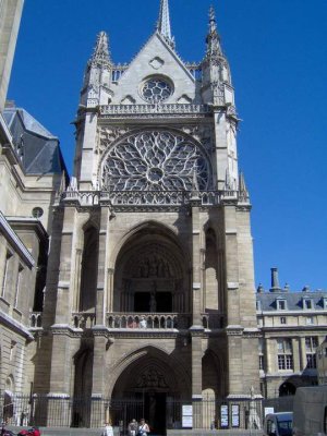 Interior view of Sainte-Chapelle with vibrant stained glass windows and Gothic architecture