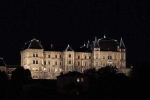 Lycée Saint-Just illuminated at night in Lyon