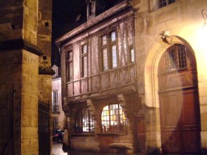 Nighttime view of Maison Millière building in Dijon, Burgundy, France