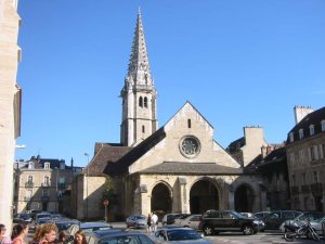 Exterior view of Saint-Philibert Church in Dijon featuring gothic architectural elements