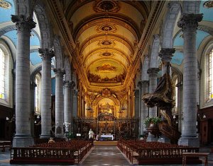 Interior view of Église Saint-André featuring the choir and ornate architectural details