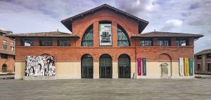 Facade of Les Abattoirs modern art museum with urban Vitry artwork