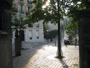 View of Place Dalida from Rue Girardon showing square and surrounding buildings