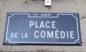 Metal plaque showing the name Place de la Comédie in Lyon 1st arrondissement