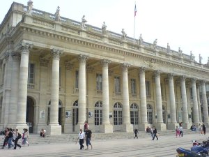 Classical facade of the Grand Théâtre de Bordeaux with ornate columns and sculptures