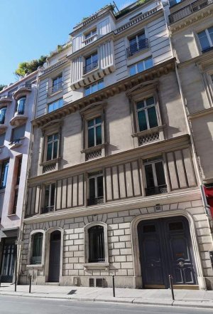 Facade of the One-Two-Two building at 122 rue de Provence in Paris