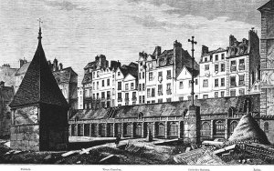 Historic entrance of Saints Innocents Cemetery in Paris