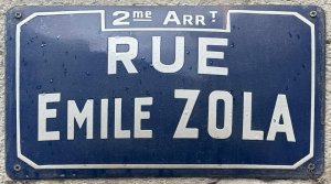 Street name plaque for Rue Émile Zola in Lyon