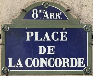 Street plaque showing the name Place de la Concorde in Paris