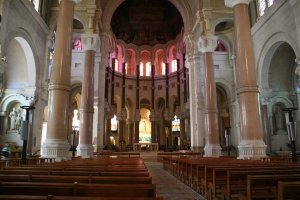 Interior view of the Minor Basilica of the Sacred Heart in Marseille featuring religious architectural details