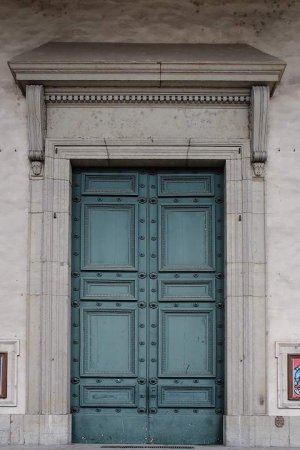 ornate main entrance door of Église Saint-Pothin in Lyon