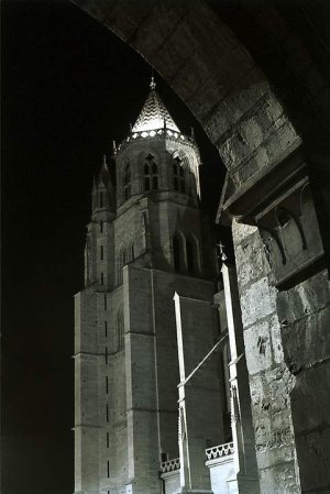Dijon Cathedral illuminated at night with dark sky