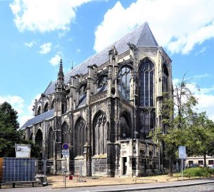 Exterior view of the Gothic Saint-Éloi church in Rouen showing detailed stone architecture