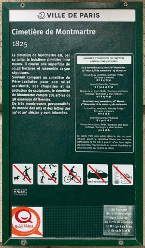 Place name sign displaying Montmartre Cemetery on Avenue Rachel in Paris