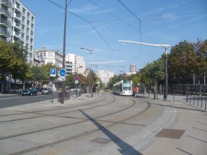 View of boulevard Kellermann with tramway T3 at Stade Charléty station in Paris 13th arrondissement