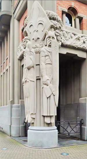 Statues of giants Lyderic and Phinaert on Lille town hall belfry