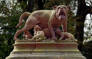Cast iron bronze statue La chienne de Rouillard at entrance to Grand Rond garden Toulouse