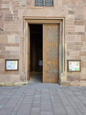 Exterior view of the entrance to Saint Thomas Church in Strasbourg showing the architectural facade